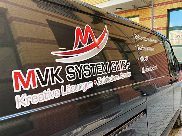 mvk_Transporter_Lager_Logo MVK System GmbH Transporter für Warenauslieferung - Nahaufnahme Logo
